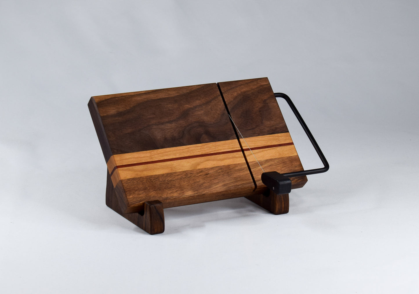 Multi wood handmade cheese slicer. Woodwork locally made in Georgia.
