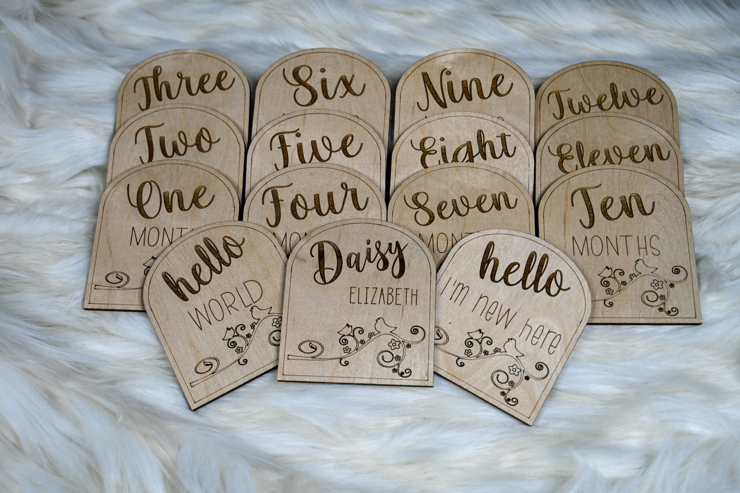 Personalized wooden baby milestone markers to be used when photographing babies during their first year. Features a laser engraved design and personalized with the baby's first and middle name.