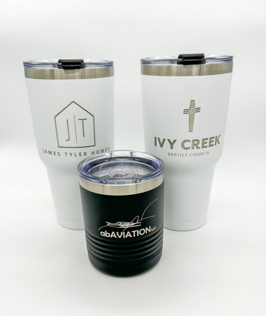 Laser engraved tumblers used as promotional products for various companies.