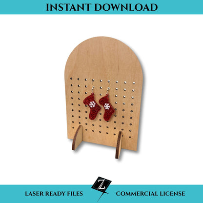 Arch-shaped laser-cut earring display stand made from wood with acrylic stocking earrings hanging on the front.  Designed for laser cutting.