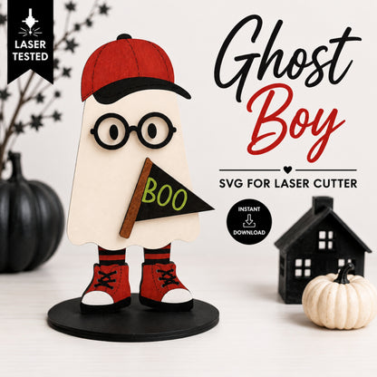 Digital product listing for a laser-cut SVG file of a 'Ghost Boy' Halloween decoration. The design features a cream-colored ghost body, a red baseball cap, black glasses, red and black sneakers, and a black flag with green 'BOO' text.