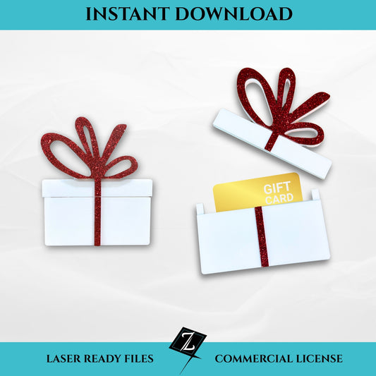 Acrylic laser-cut gift card holder shaped like a wrapped present with a red glitter bow and white base, shown open and closed on a white background.
