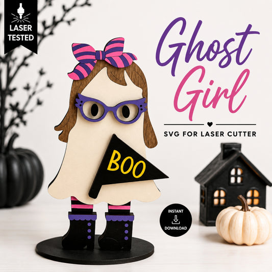 A Halloween-themed SVG cut file preview showing a stylized ghost girl figure with a pink striped bow, purple glasses, brown hair, a cream ghost body, black boots, and a black flag reading BOO. The image includes text reading 'Ghost Girl', 'SVG FOR LASER CUTTER', 'LASER TESTED', and 'INSTANT DOWNLOAD', with decorative pumpkins and a small house in the background.