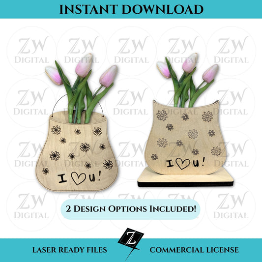 Digital listing image displaying two wooden laser-cut vases with engraved “I ❤️ U!” messages and flower doodles, each holding real pink tulips. One vase design includes a hanging wire; the other rests on a rectangular base. Text reads “Instant Download,” “2 Design Options Included,” and “Laser Ready Files - Commercial License.”