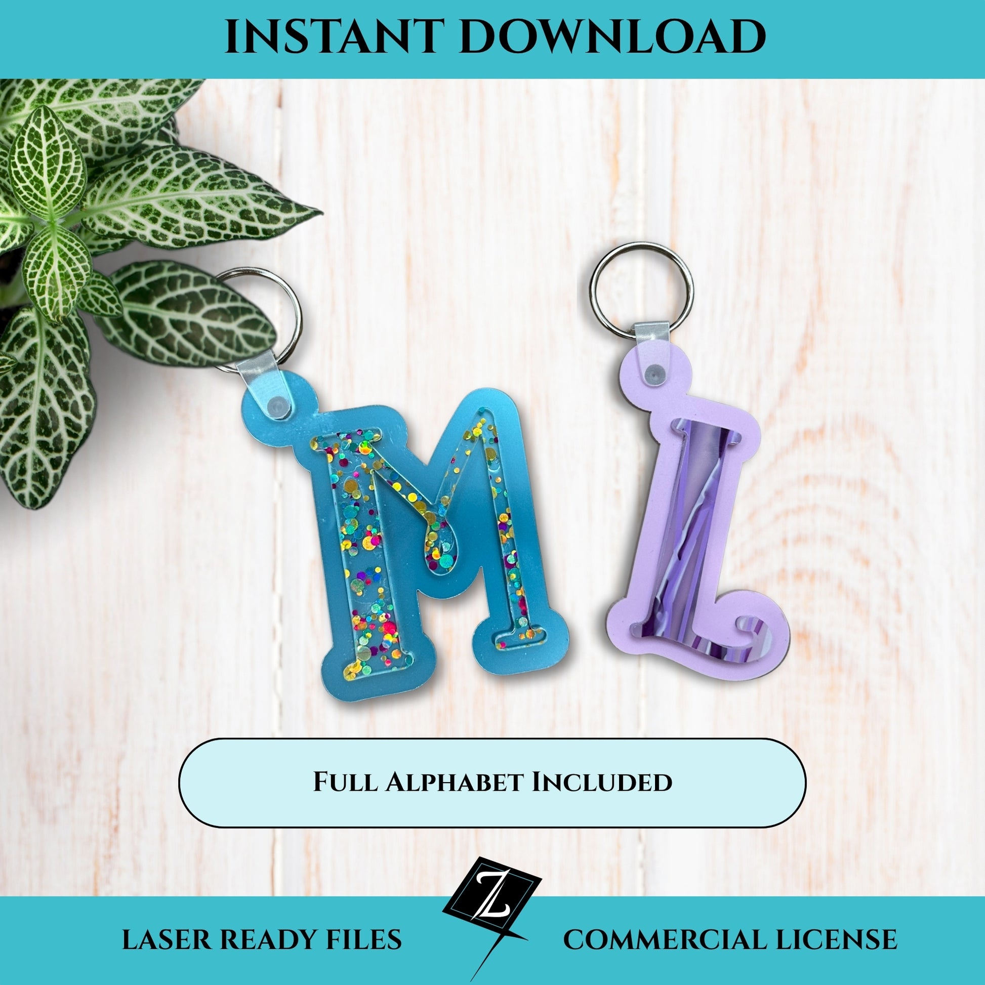 Two colorful monogram keychains; one featuring the letter 'M,' the other, a letter 'L.' Keychains are on a on a light wooden surface with a plant in the corner.