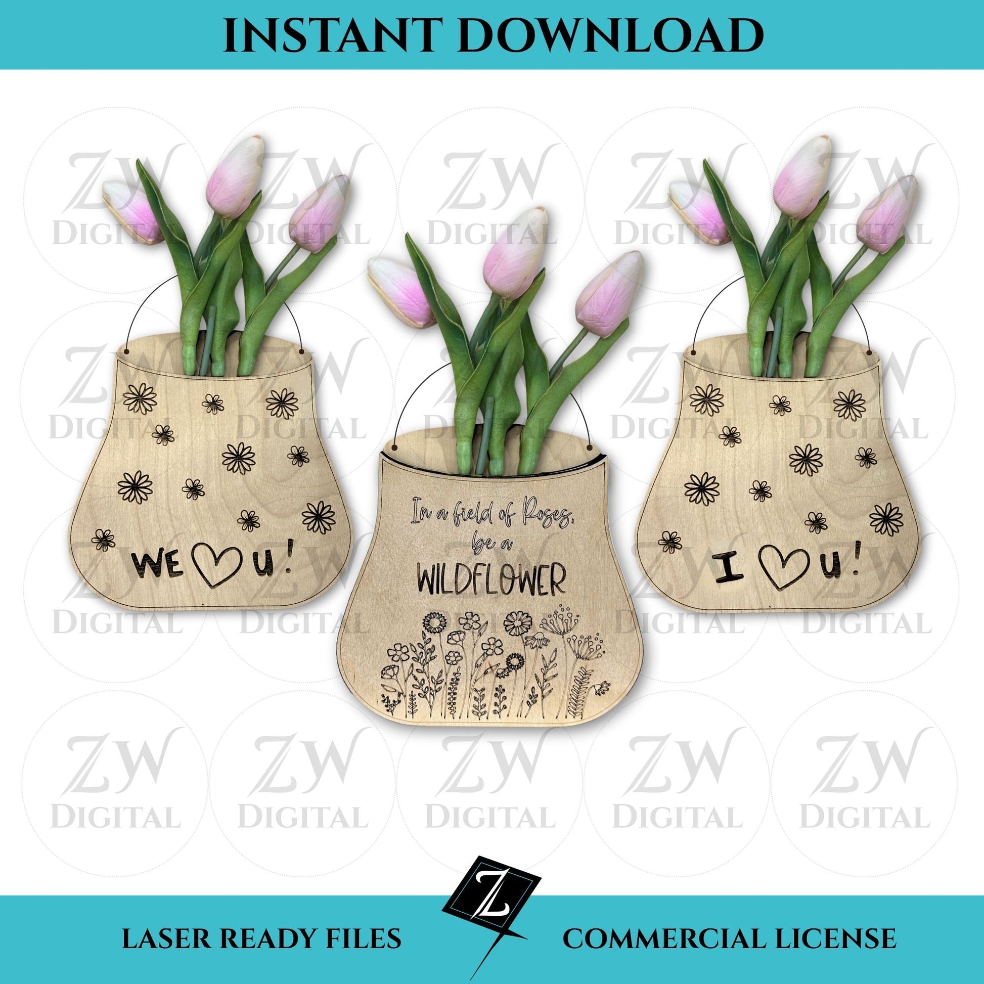 Three laser-cut layered wooden vases made from birch plywood, featuring engraved message of "In a field of roses, be a wildflower," "I love you," and "we love you" with scored floral details, displayed with pink tulips; one vase stands on a wooden base and the other hangs with twine.