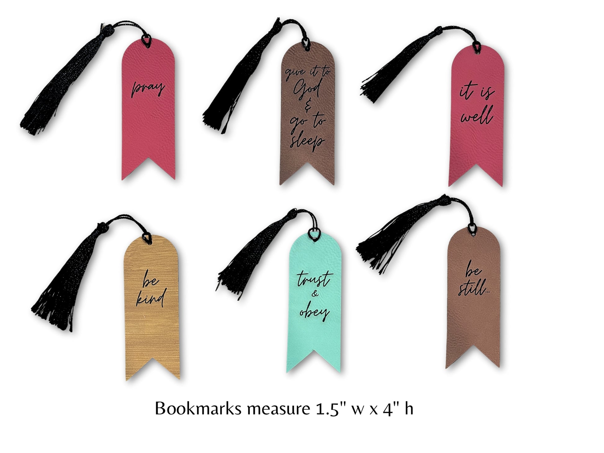 Six leatherette bookmarks shown with black tassels and engraved Christian quotes, including “pray,” “give it to God & go to sleep,” “it is well,” “be kind,” “trust & obey,” and “be still,” in various colors like red, teal, brown, and bamboo.