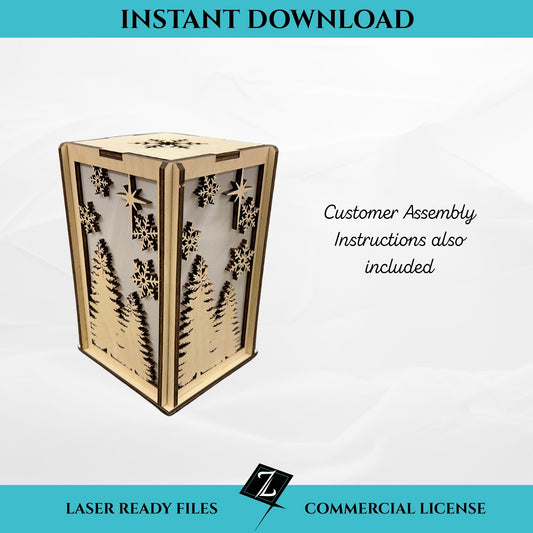 Winter scene lantern SVG file for laser cutting, instant download. Wooden flat-pack lantern with trees, snowflakes, and star cutout panels. Includes customer assembly instructions and commercial license.