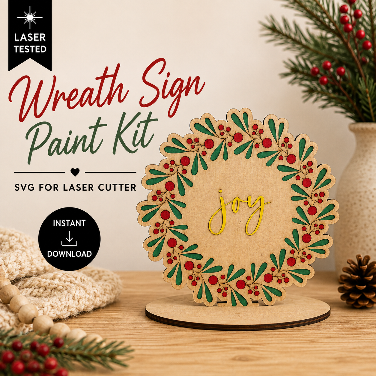 Wreath sign paint kit SVG for laser cutters featuring a wooden Christmas wreath with green foliage, red berries, and “joy” in the center. Instant digital download.