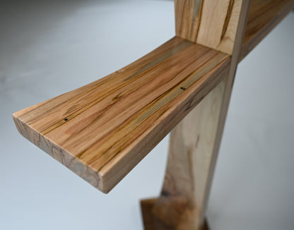 A close up image of the Ambrosia Maple of Modern Cross woodwork art.