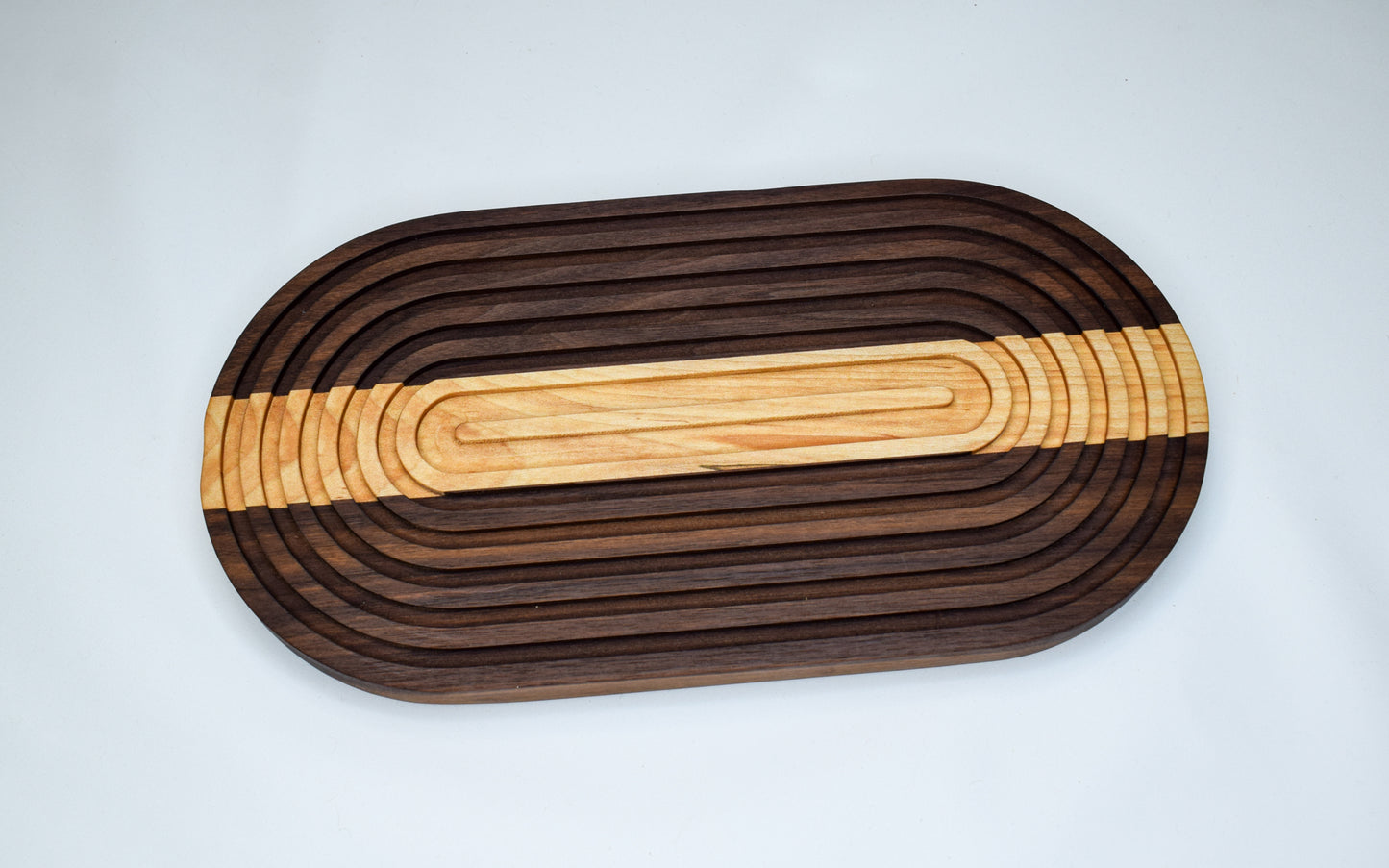 Walnut and Maple handmade wooden trivet or bread board.