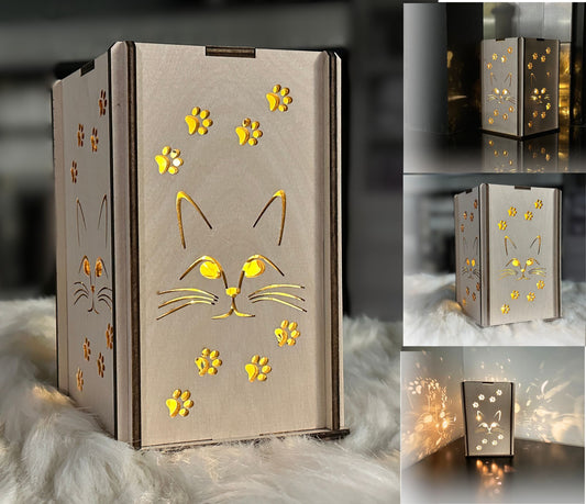 Handmade Birch wood lantern with a kitten face and paw design.