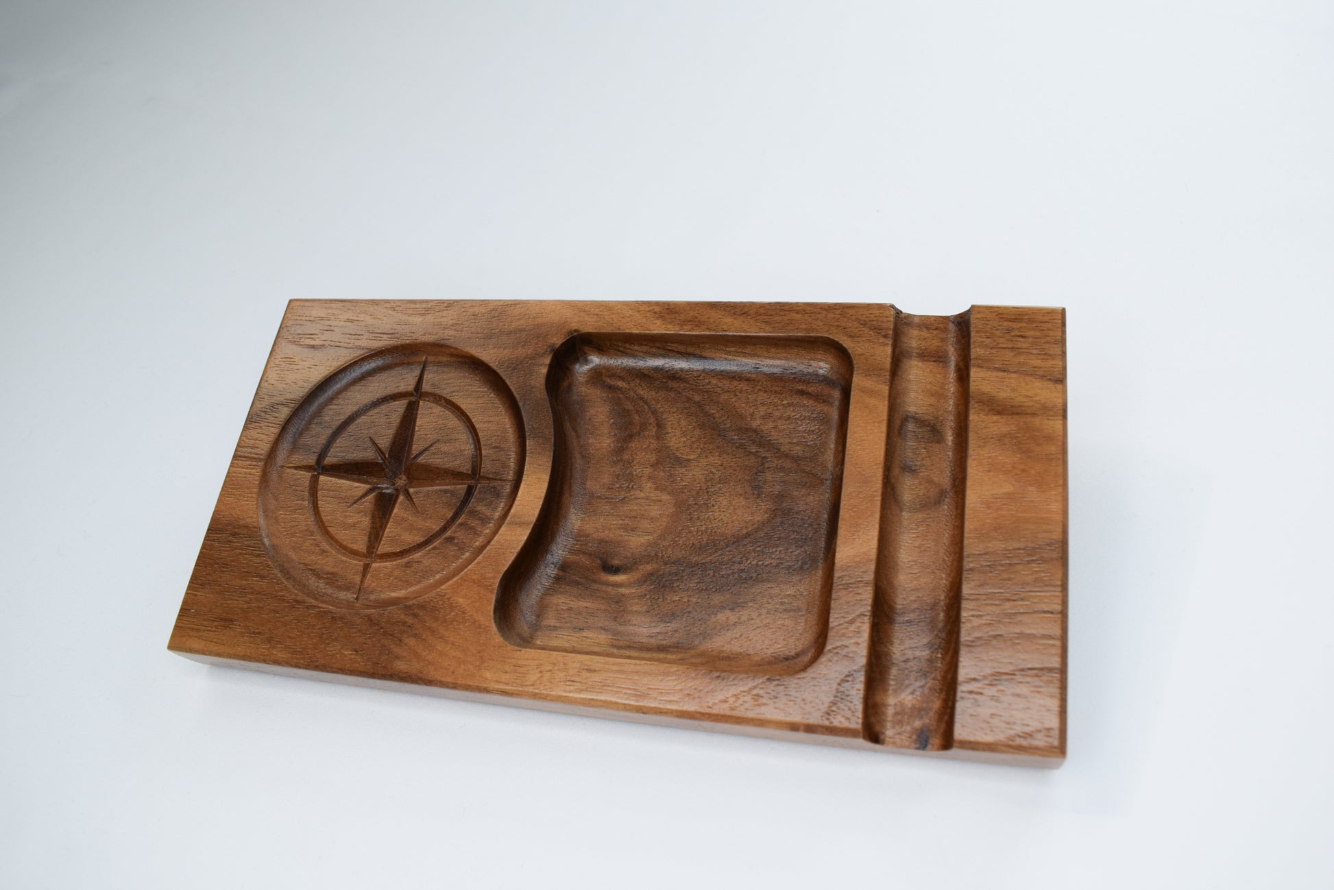 A handmade woodwork tray made for bourbon or cigar enthusiast. A place to hold your drink, snack, and cigar.