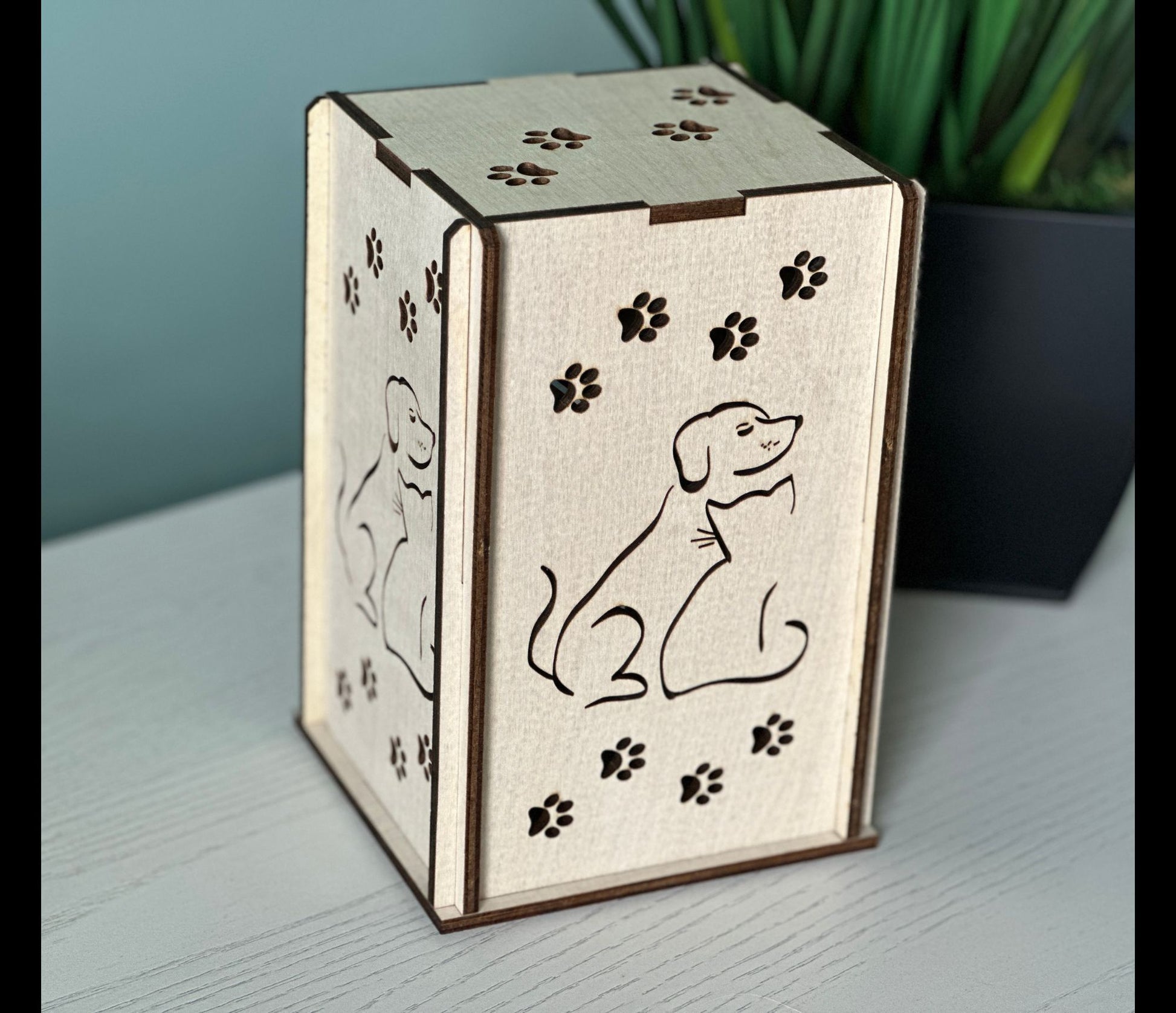 Whimsical, handmade wood lantern with a cat and dog design.