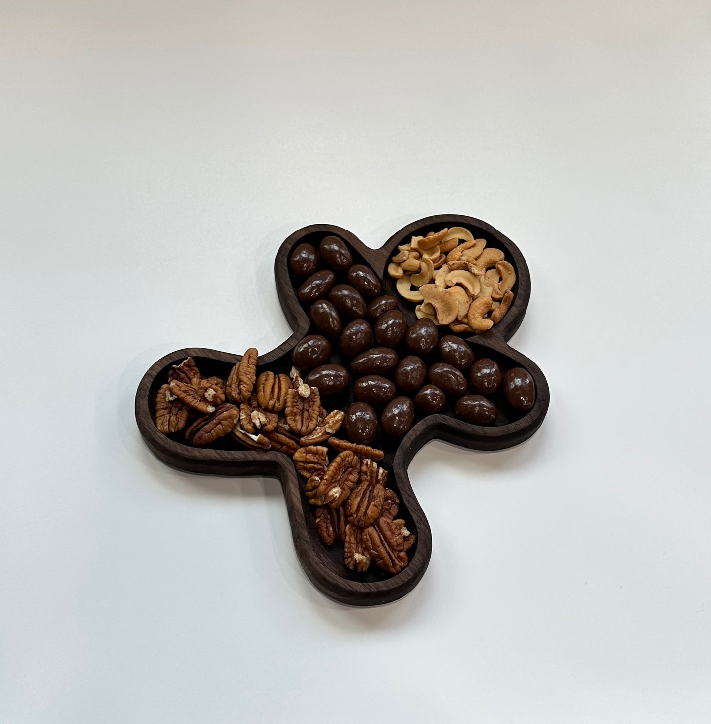 Locally made Christmas gift tray. Serve your nuts and treats in this handmade Gingerbread man tray.