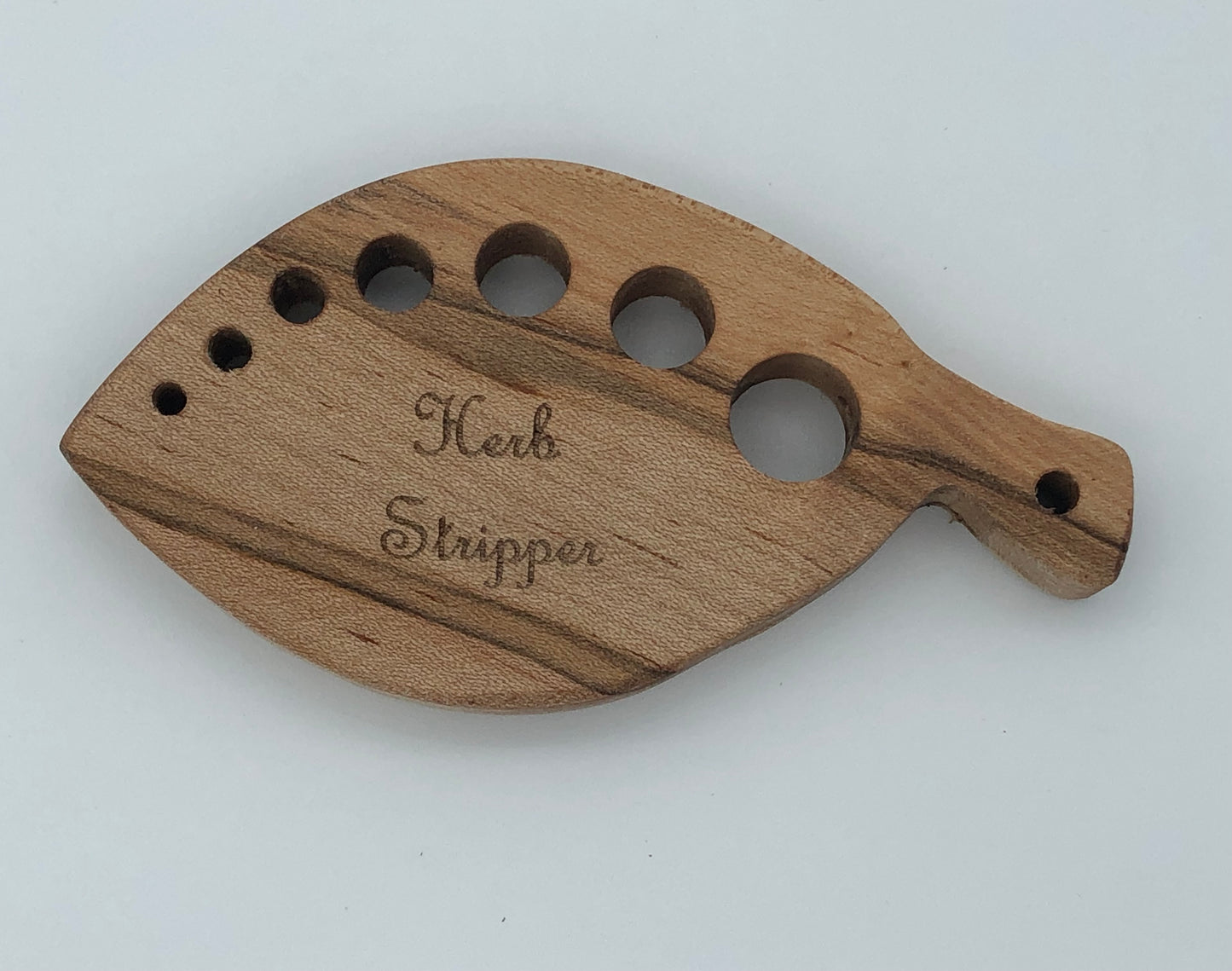 A wood herb stripper made of maple wood - locally made in Georgia.