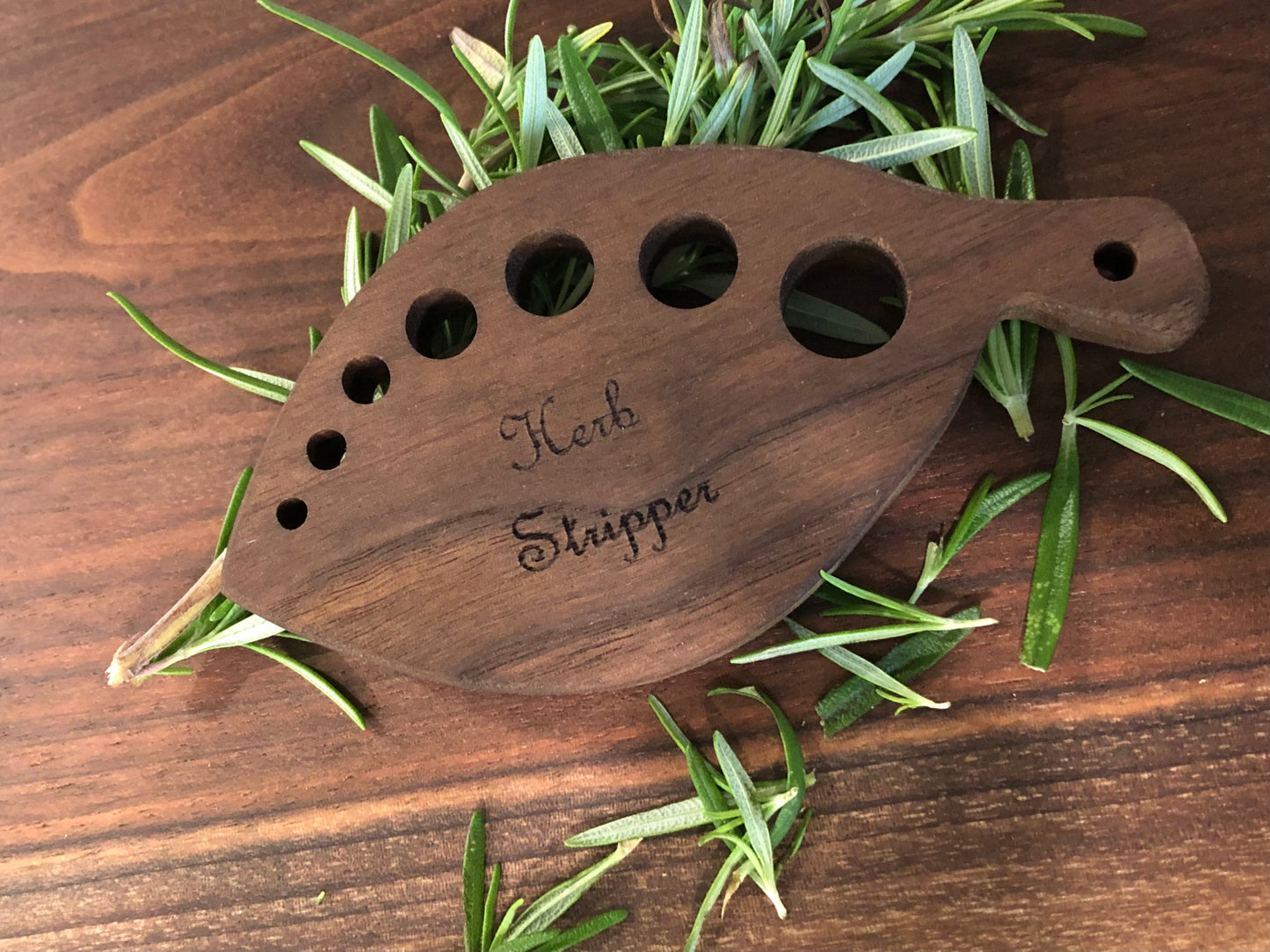 Handmade wood herb stripper used to prep your herbs for cooking.