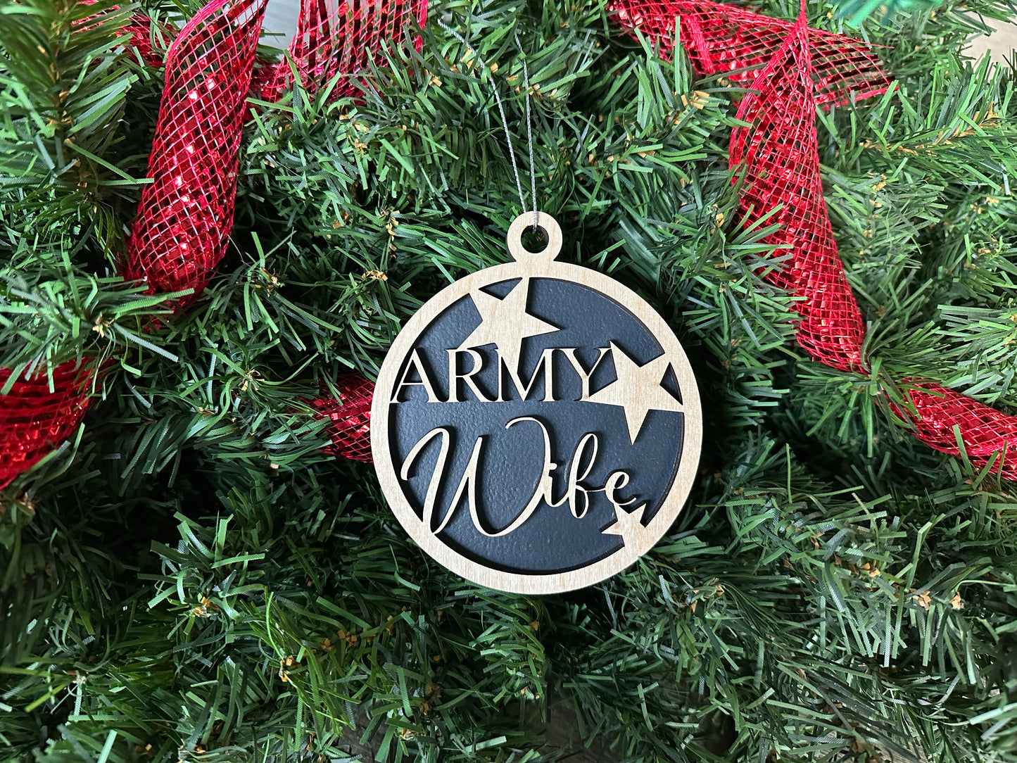 Handmade wood Christmas gift for an Army wife. A black and birchwood ornament handmade in Georgia.