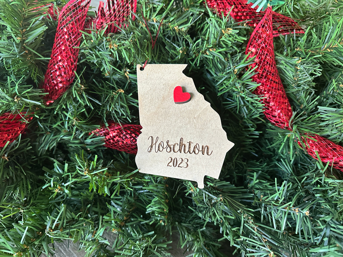 Personalized Christmas gift - wooden Georgia Christmas ornament with a red heart. City name and year laser engraved.