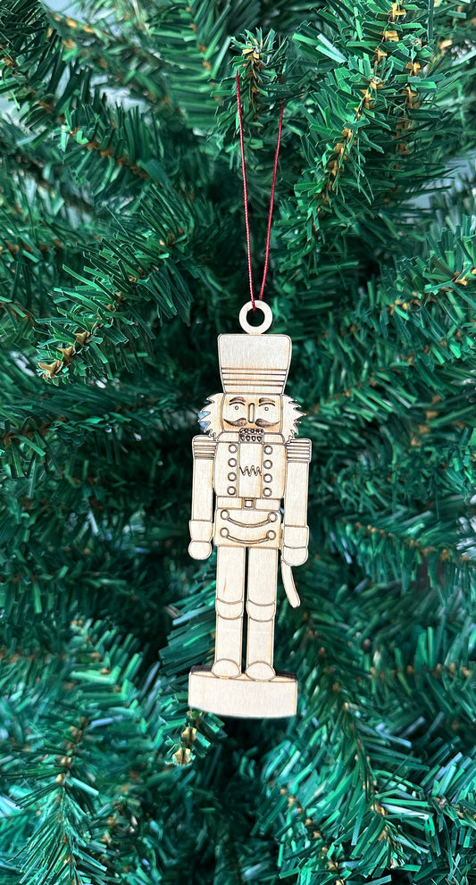 Handmade wood Christmas ornament in the shape of a nutcracker - handmade locally in Georgia.