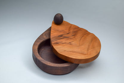 A handmade woodwork ripple design on a teardrop shaped salt cellar. Handmade in Georgia with cherry wood.