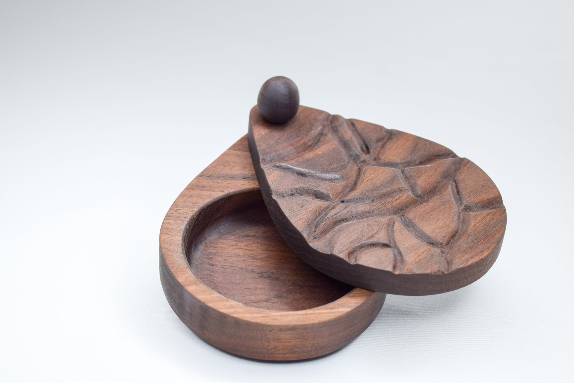 "Pebble" salt cellar beautifully handcrafted out of walnut wood.