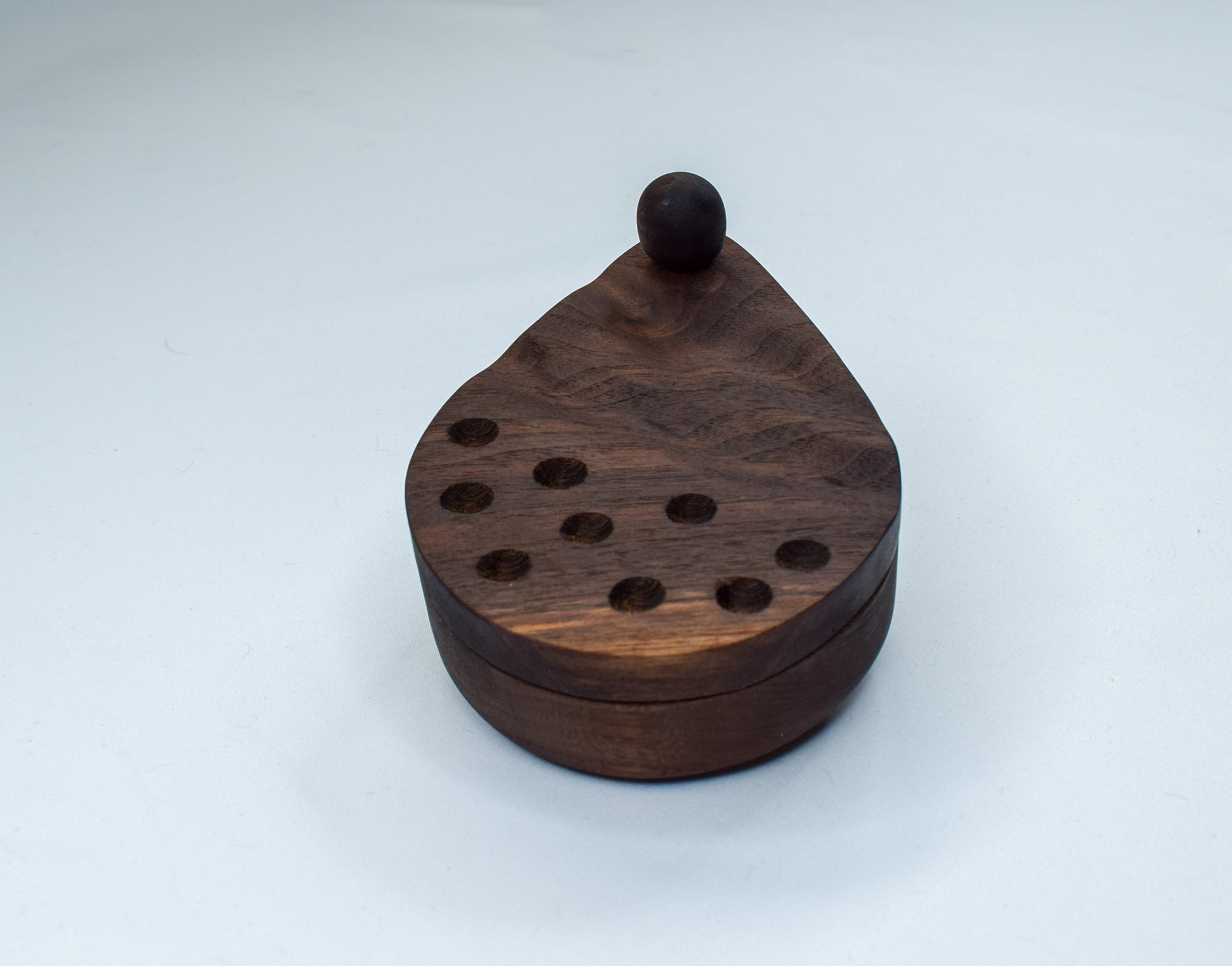 Handcrafted salt cellar - made out of dark walnut wood and shaped like a teardrop.