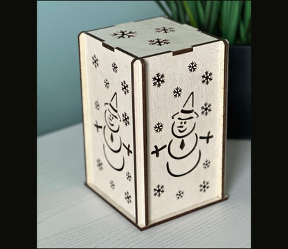 A snowman themed wooden lantern - handmade with Birchwood in Georgia.