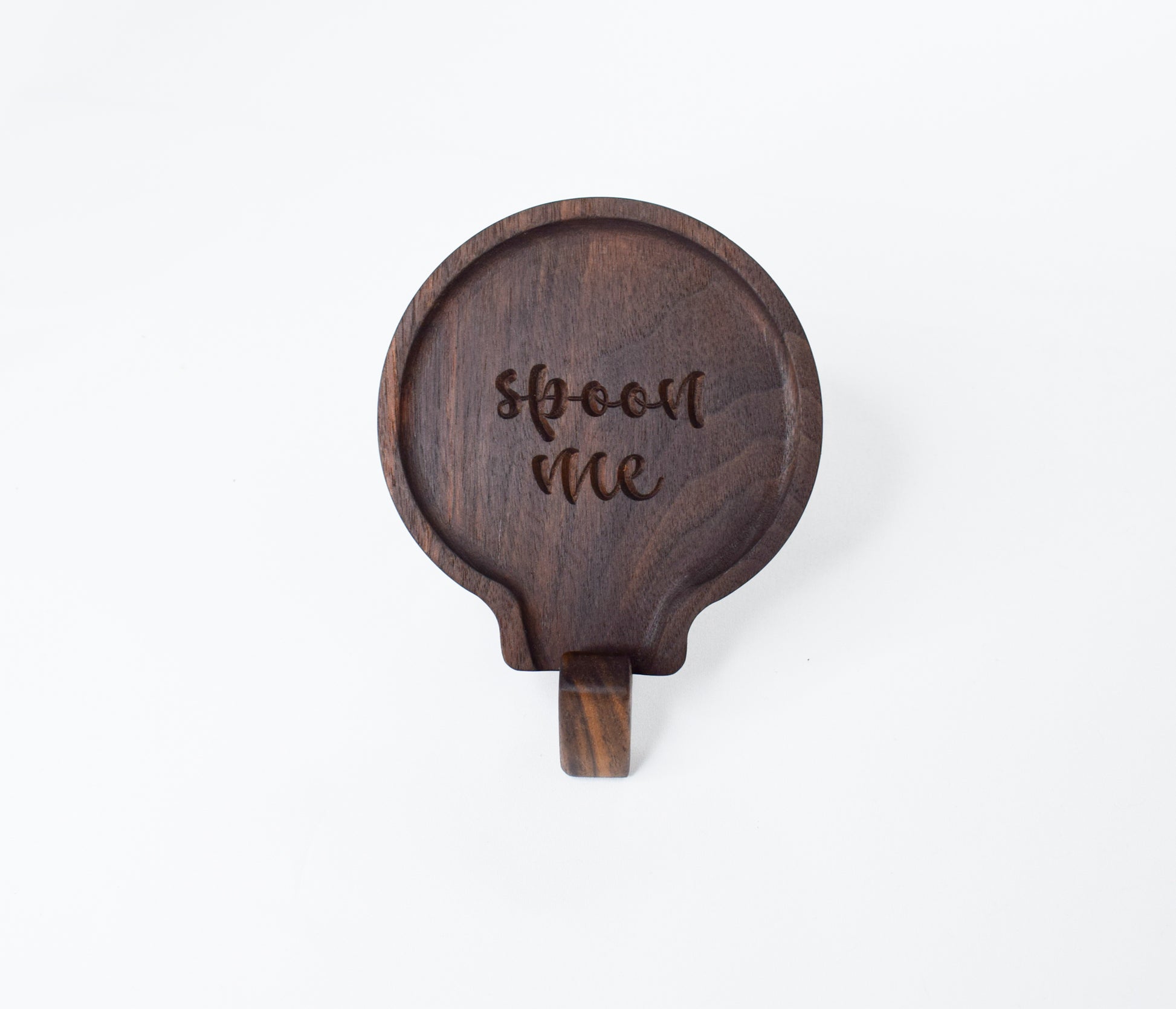 A fun gift idea for those who love to cook - a handmade wooden spoon rest with the saying "spoon me"