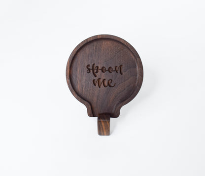 A fun gift idea for those who love to cook - a handmade wooden spoon rest with the saying "spoon me"