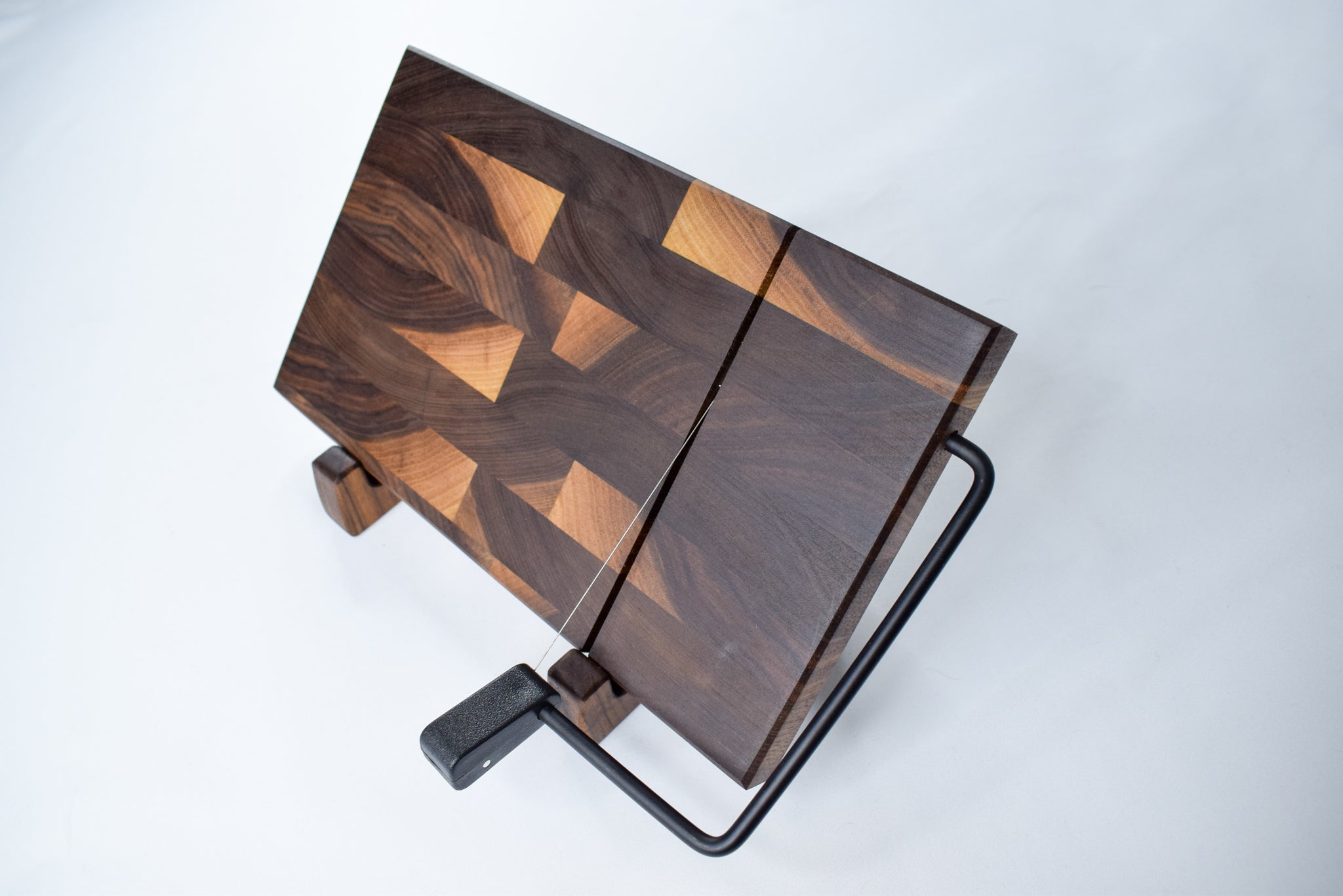 Zigs_Woodshed_Cheese_Slicer_on_Stand_-_Walnut_-_Front_Angled_2.jpg
