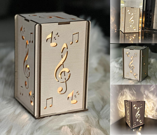 A handmade wooden gift for the music lover in your life - a wooden lantern with music notes.