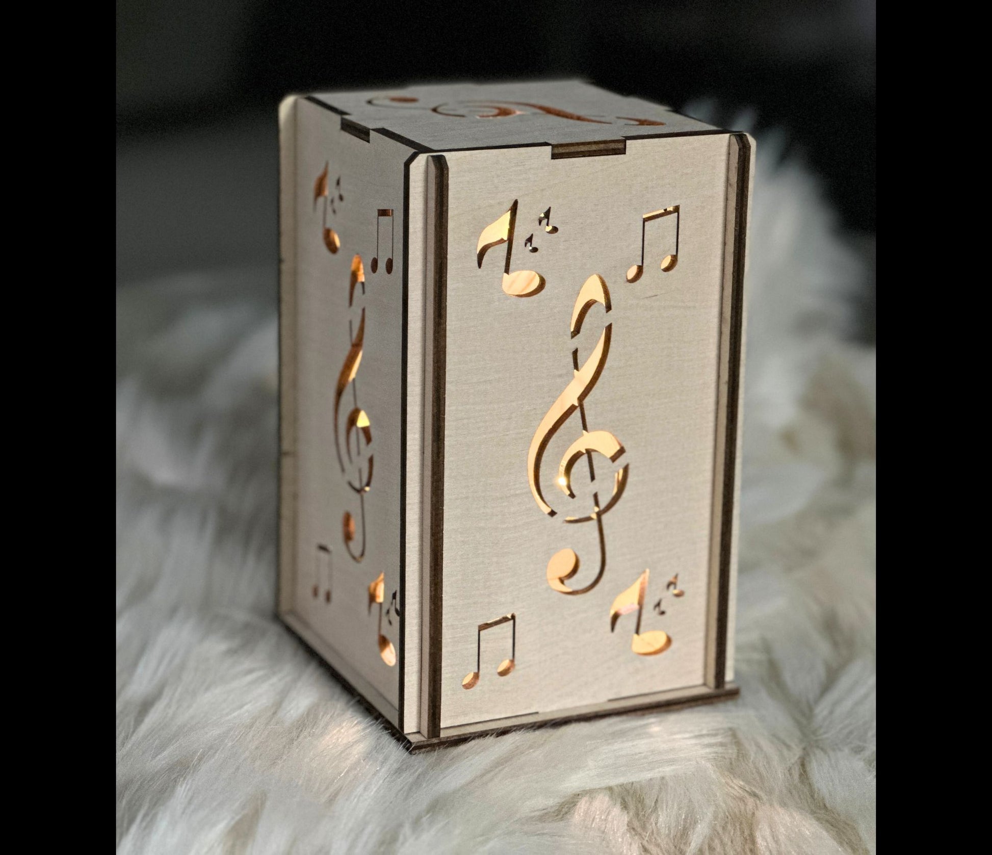 Handmade woodwork gift for music lovers - A wooden lantern featuring a music note design.